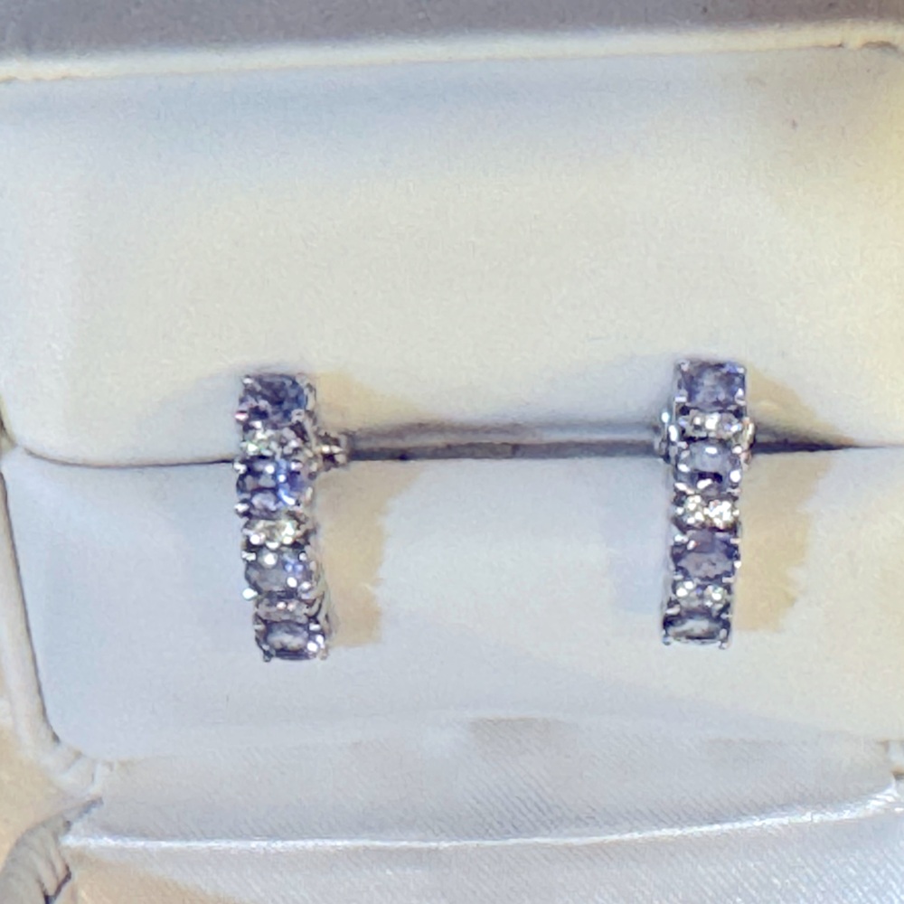 18kt tanzanite and diamond earrings. Worn once and look brand new.